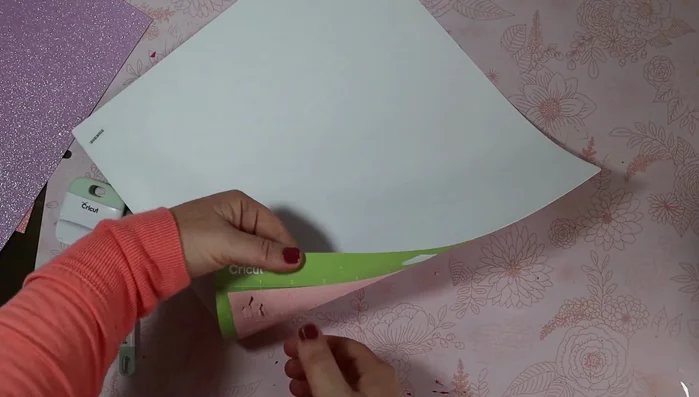 Use a scraper to remove any leftover confetti pieces from the mat.