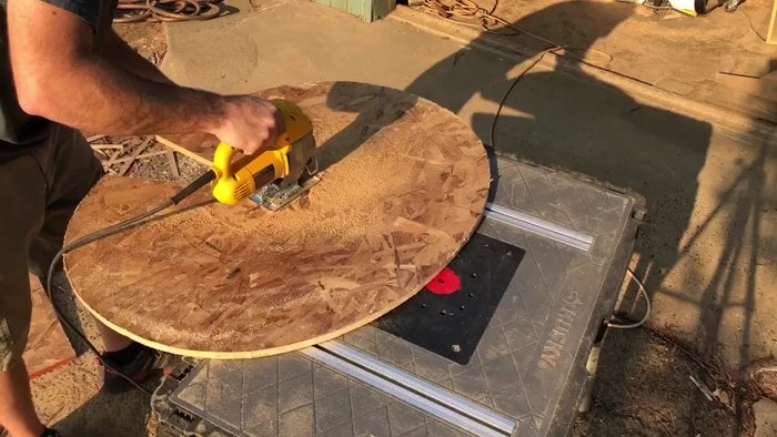 Create the letter shape: Trace a giant letter onto your OSB backerboard using a stencil. Cut out the shape with a jigsaw.