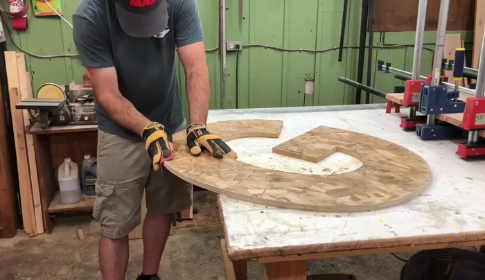 Sand the edges: Smooth the edges of the cut letter with 150-grit sandpaper to remove splinters and inconsistencies. Use an orbital sander for a smoother finish.