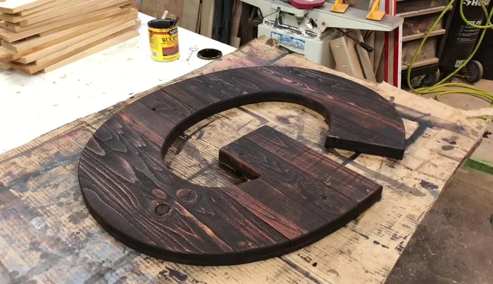 Add finishing touches: Apply a spray finish if desired. Add hangers to the back for easy hanging.