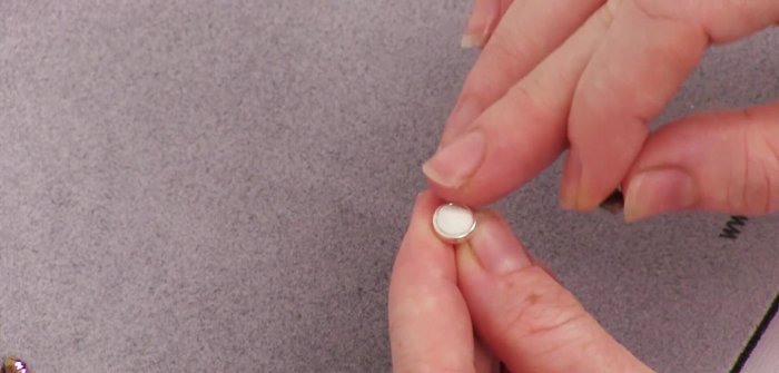 Center a pointed sew-on in the clay.