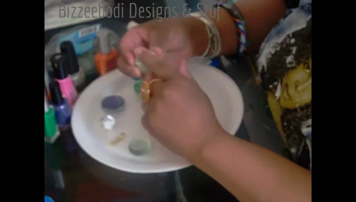 Add additional layers of nail polish and/or glitter for desired design. Let each layer dry completely.