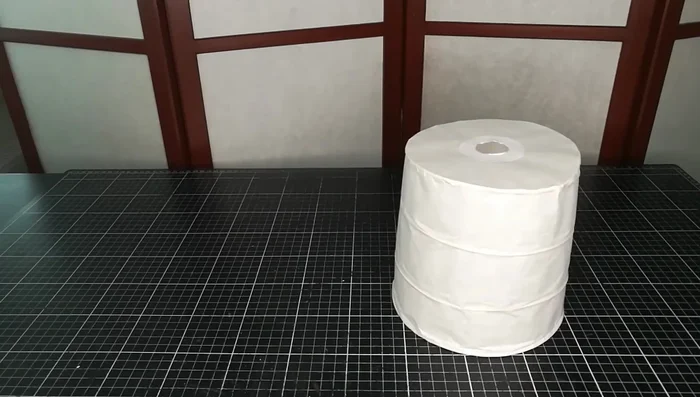 Hang the lantern using a false light bulb (method shown in video).