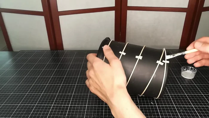 Apply diluted wood glue to the structure.