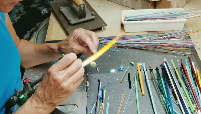 Heat the green dots, pulling them slightly toward the center to blend them into the base.