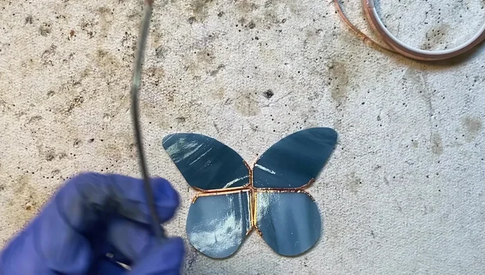 Add more solder as needed to secure the attachment.