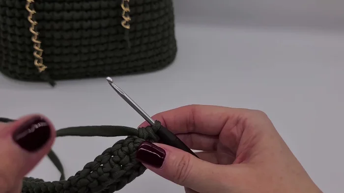 Continue adding rows until desired height is reached; hold the top of the backpack occasionally to check the width.