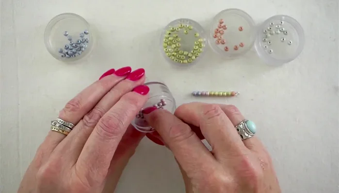 Repeat steps 1 & 2 to create additional dangle pieces with varying bead combinations.