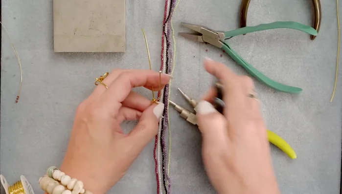 Trim the excess wire with flush cutters and squeeze the end flat with pliers.