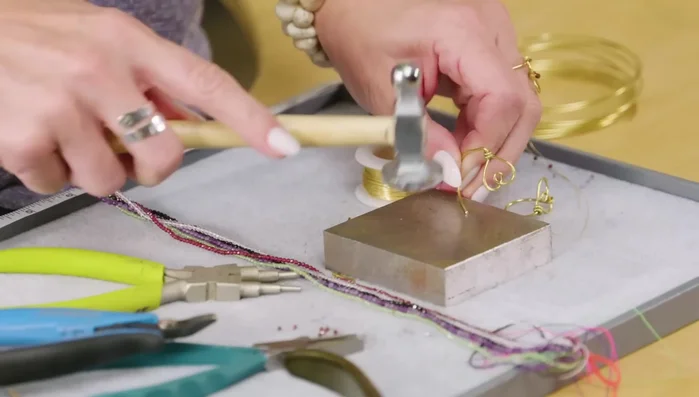 Use a chasing hammer to shape the paddle.