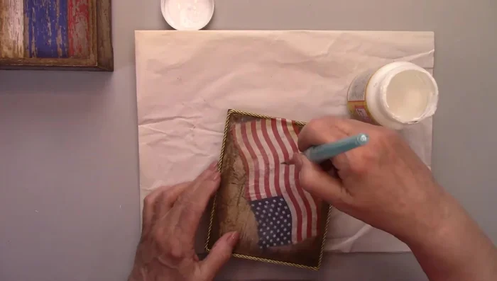 Apply a final coat of clear gloss varnish to seal everything.