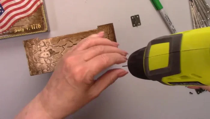 Reattach hinges and clasp; optionally add gold wax rub to these hardware elements.