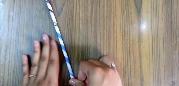 Secure the wrapped rolls with glue.