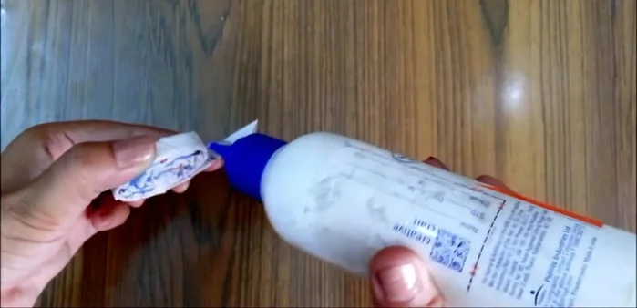 Secure the wrapped rolls with glue.