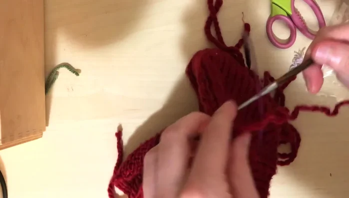 Cast off using a yarn needle to remove stitches from needles.