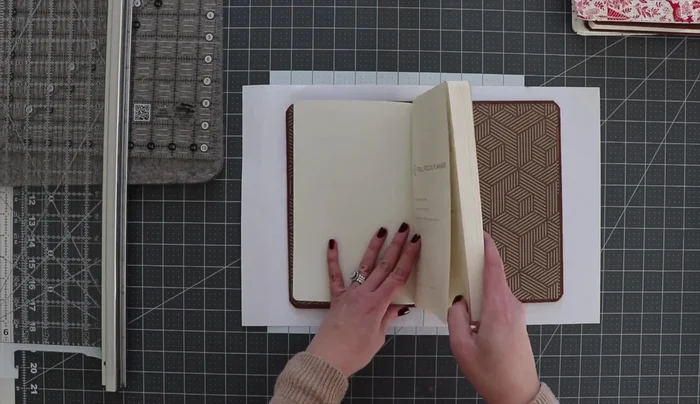 Create a template: Trace the journal onto paper, adding ½ inch beyond all edges to allow for seam allowance and quilting. Round the corners if needed.