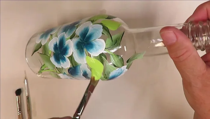 Add final touches: Lightly apply a final color with a stippler brush (e.g., thicket) to the centers of flowers for subtle texture.