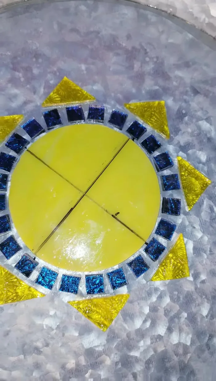 Add the larger decorative glass pieces, ensuring the pretty side is up.