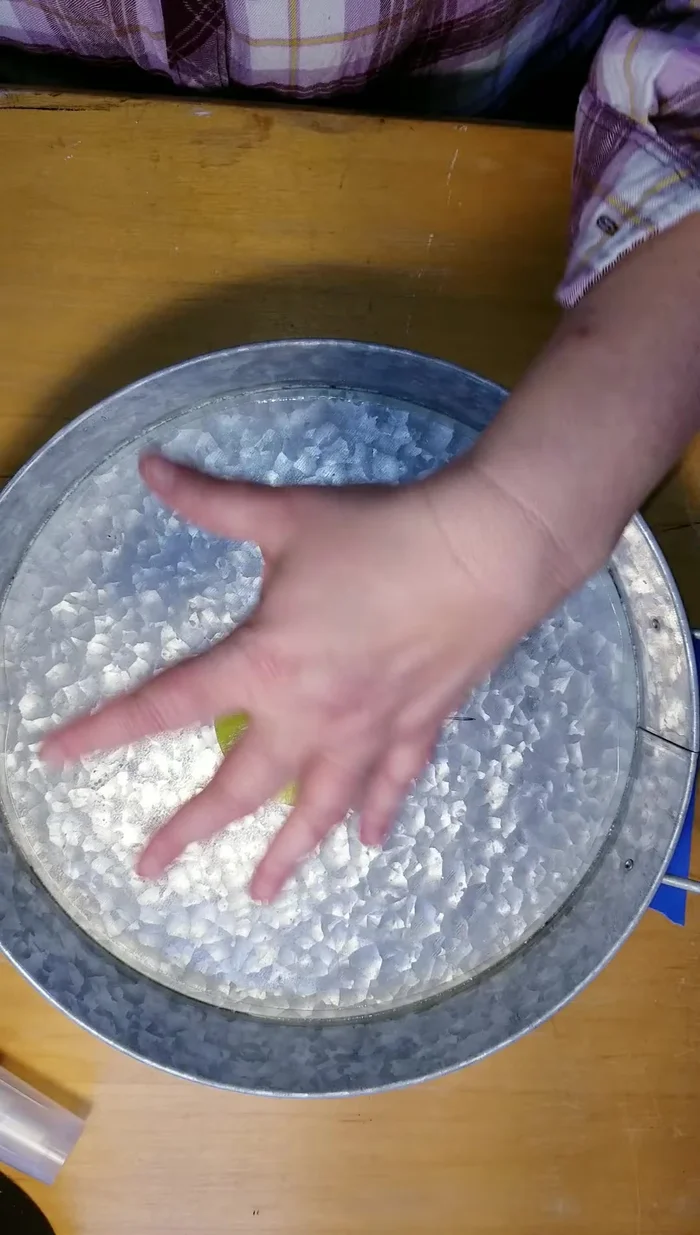 Center and adhere the circular glass piece to the tray, checking for even spacing with a ruler.