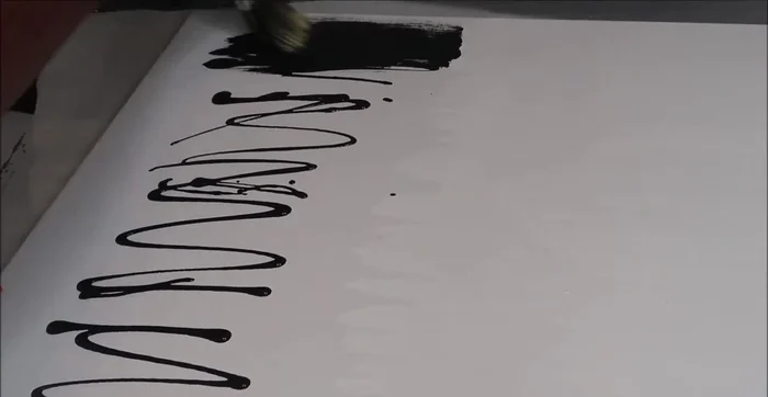 If needed, add a second coat of black paint to areas that appear too transparent or have visible brush strokes.