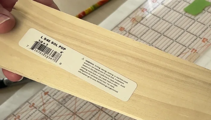 Sand the edges of the wood for smoothness.