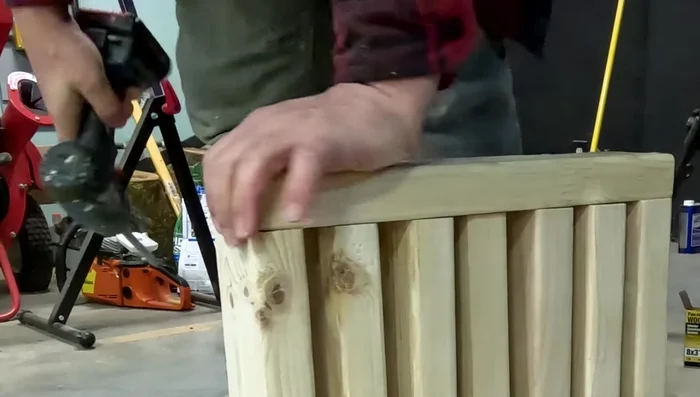 Attach baseboards to the legs, using a 1x4 spacer to maintain even spacing between legs.
