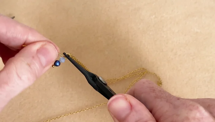 Trim the excess wire and tuck the end in to prevent scratching.