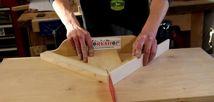 Cut 45-degree miters on the ends of the side pieces.