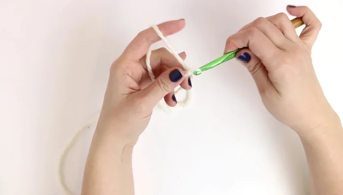 Round 4: Chain 1, single crochet in the same stitch, then *1 single crochet, 1 single crochet, 2 single crochet in the next stitch*. Repeat from * to * around (28 total stitches). Slip stitch to join.