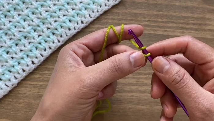 Skip the next chain and work two double crochets in the following chain.
