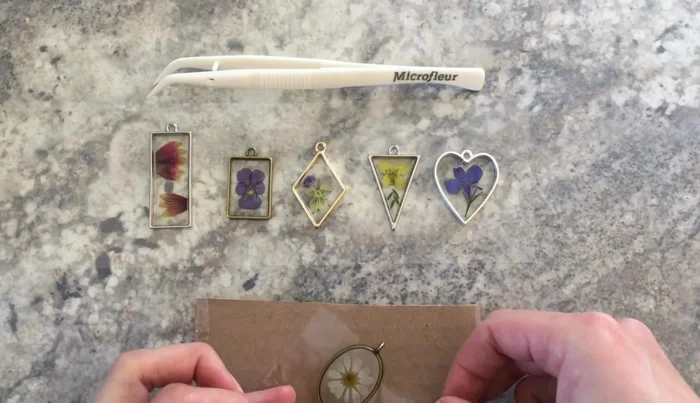 Clean any tape residue using soapy water and a toothpick.