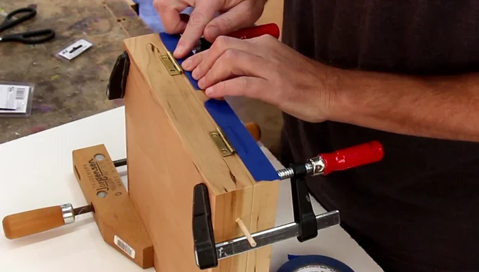 Apply felt to the bottom of the box.