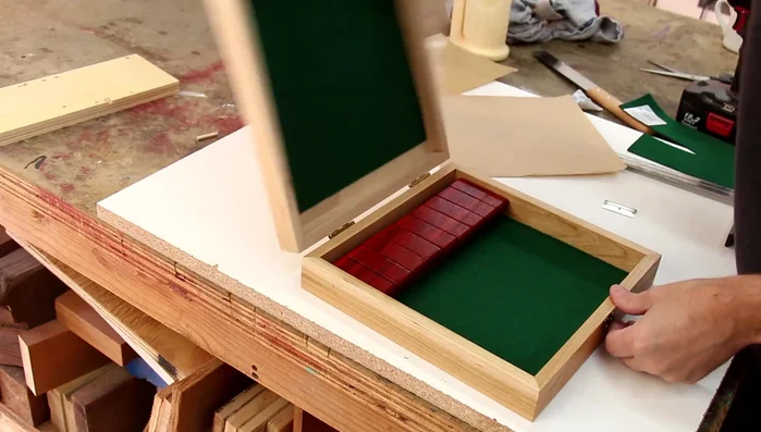 Apply felt to the bottom of the box.