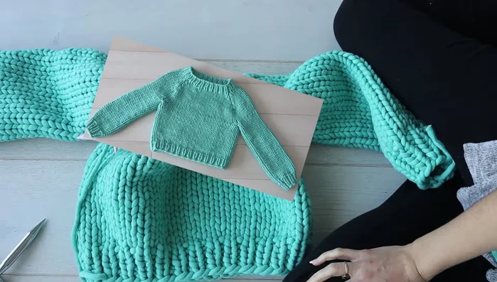 Follow your pattern's instructions for decreasing to shape the shoulders and yoke.