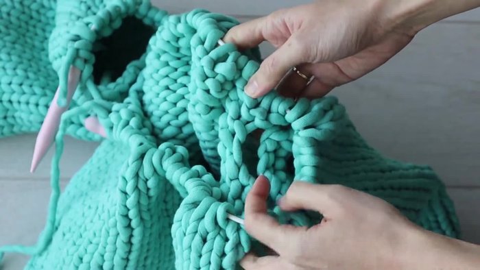 Knit the body and sleeves separately according to your chosen pattern.