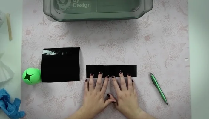 Apply transfer tape to the weeded stencil.