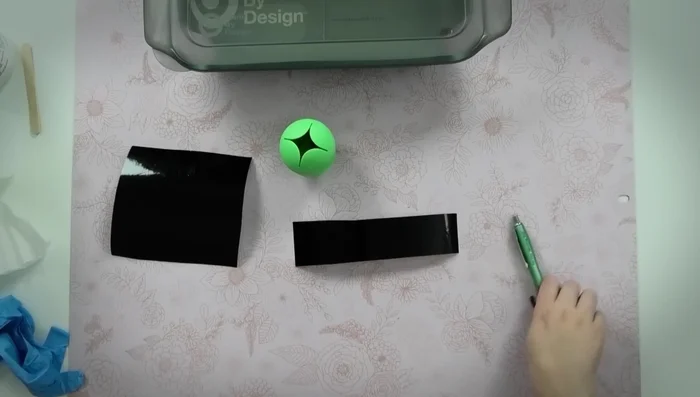 Apply transfer tape to the weeded stencil.