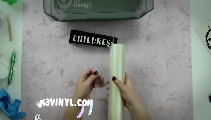 Apply transfer tape to the weeded stencil.