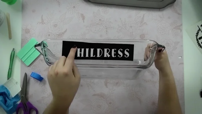 Carefully wipe away remaining etching cream with baby wipes, avoiding excessive rubbing on the glass.