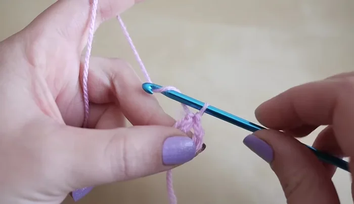 Join with a slip stitch to the top of the third chain from the beginning chain three.