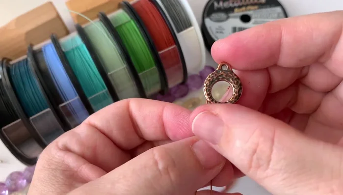 Crimp the first tube: Use crimping pliers to securely crimp the tube, creating a strong connection to the clasp.