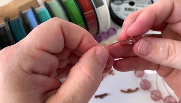 Repeat steps 3-5: Continue adding beads and crimping tubes until you have reached the desired bracelet length.