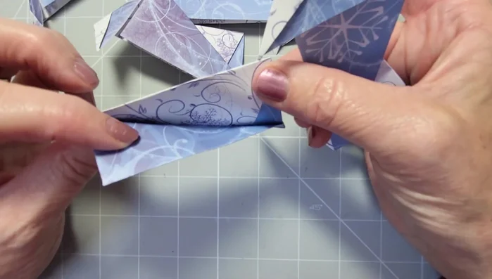 Secure the wreath by taping the folded-over sections.