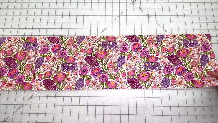 Cut ends at a 45-degree angle. Use a quilting template or crease the fabric to mark the angle.