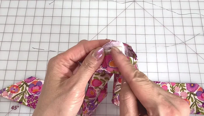 Insert wire into the opening, ensuring it goes through the channel.