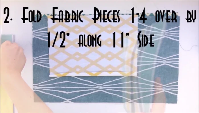 Fold fabric pieces with a 1/4" - 1/2" seam allowance and pin.