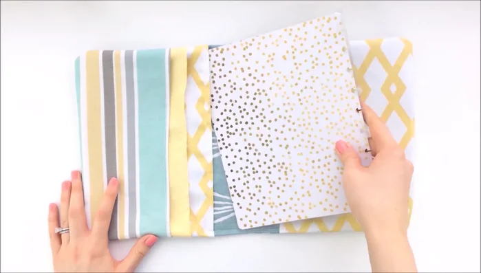 Attach the planner rings. Add an elastic band closure (or another fastening method).