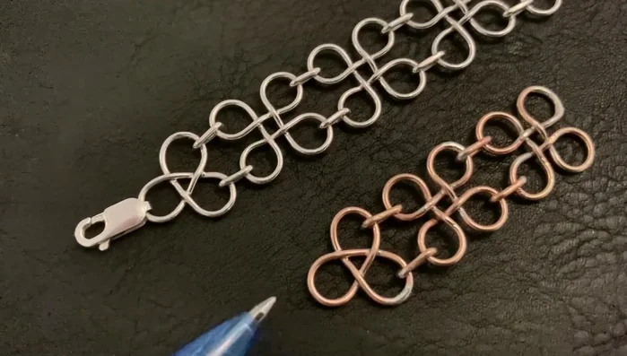 Attach the lobster claw clasp by cutting the last loop and resoldering it closed.