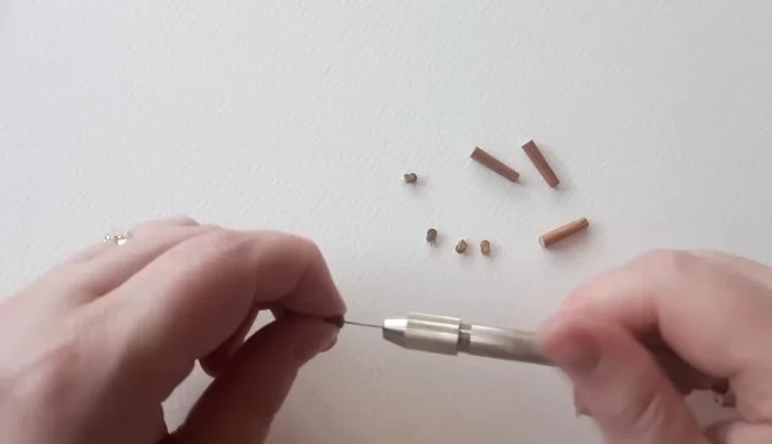 Glue legs to footstool bottom.