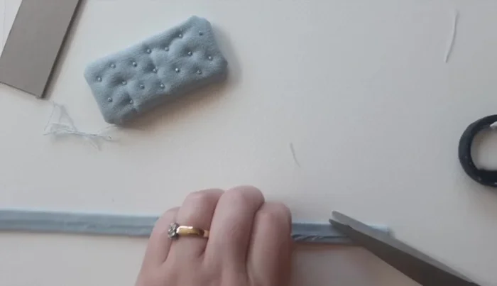 Secure loose threads and back with PVA glue to prevent fraying. Repeat for underside.